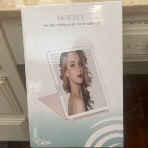 NEVER OPENED! Weily portable vanity mirror with light.